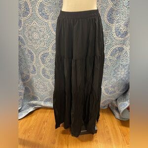 Long flowing ruffled black maxi skirt